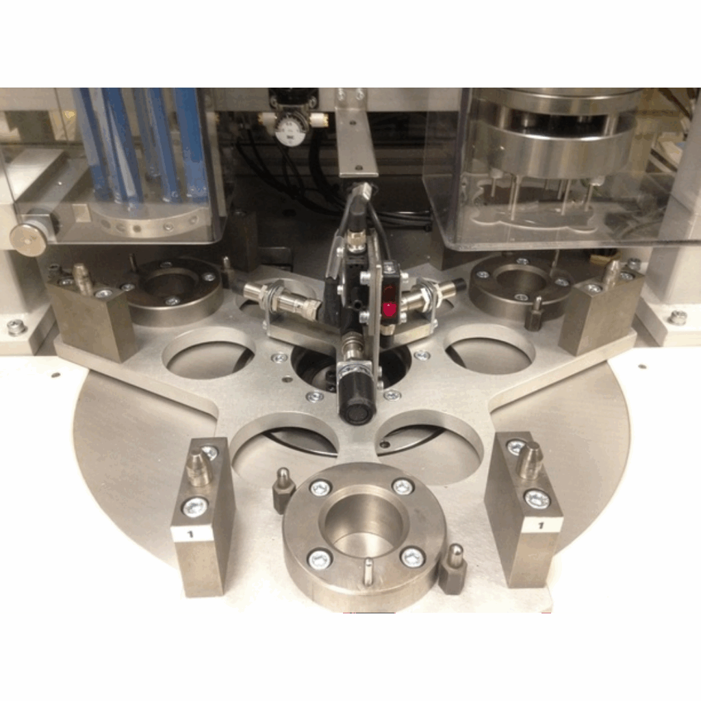 Automated 2-piece wiper seal and rotor assembly machine developed for Delphi Diesel Systems to improve production efficiency.