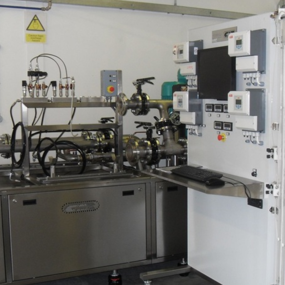 Automated flow and pressure testing rig supporting product development for Crane Building Services & Utilities.