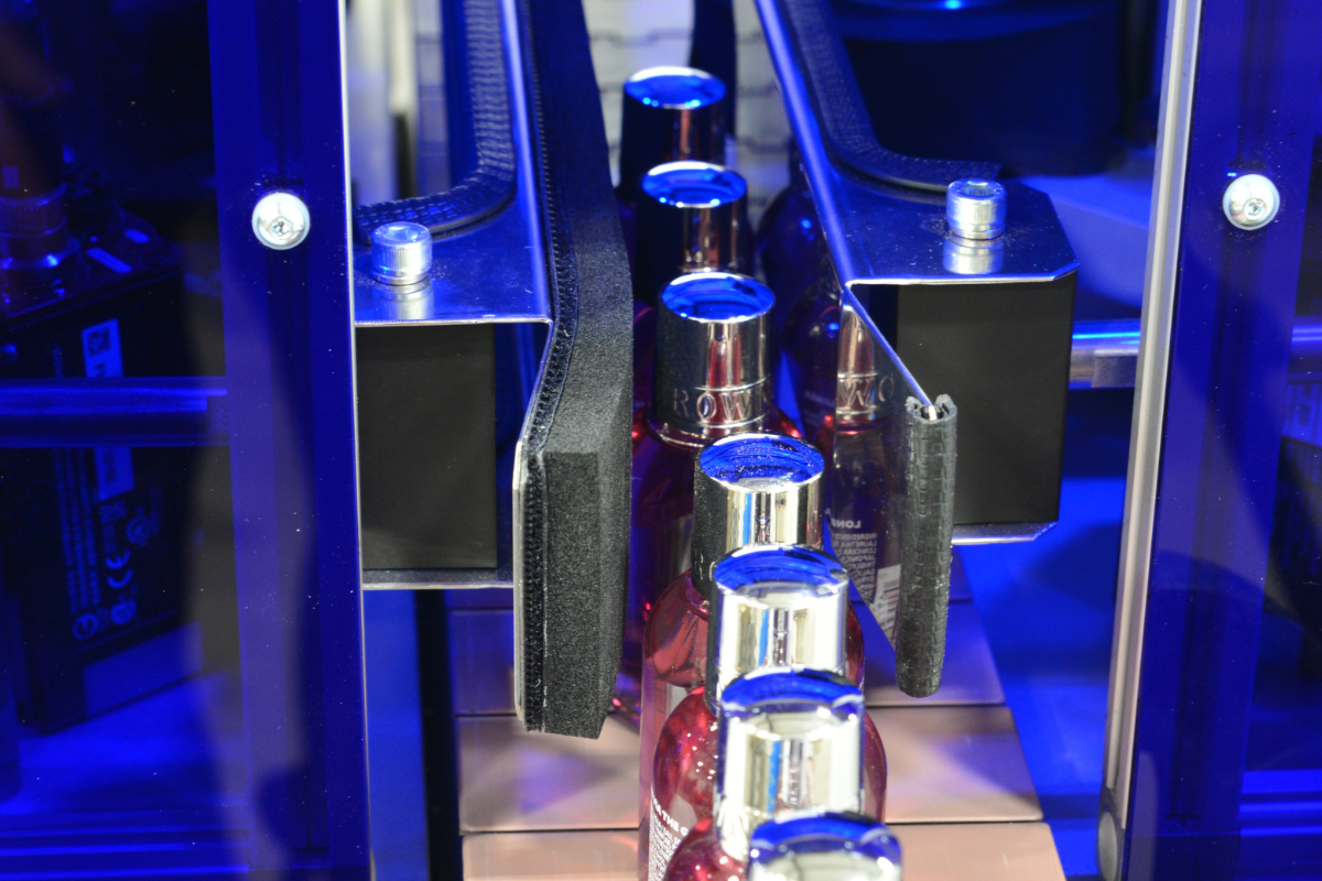 Bespoke automated system integration for manufacturing production line with controlled product handling