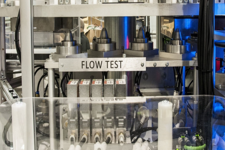 Flow-based and air leak detection test rig