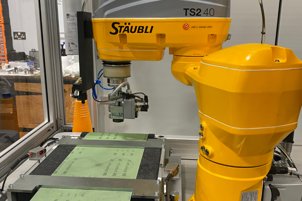 Robotic precision lapping and deburring cell with controlled surface finishing