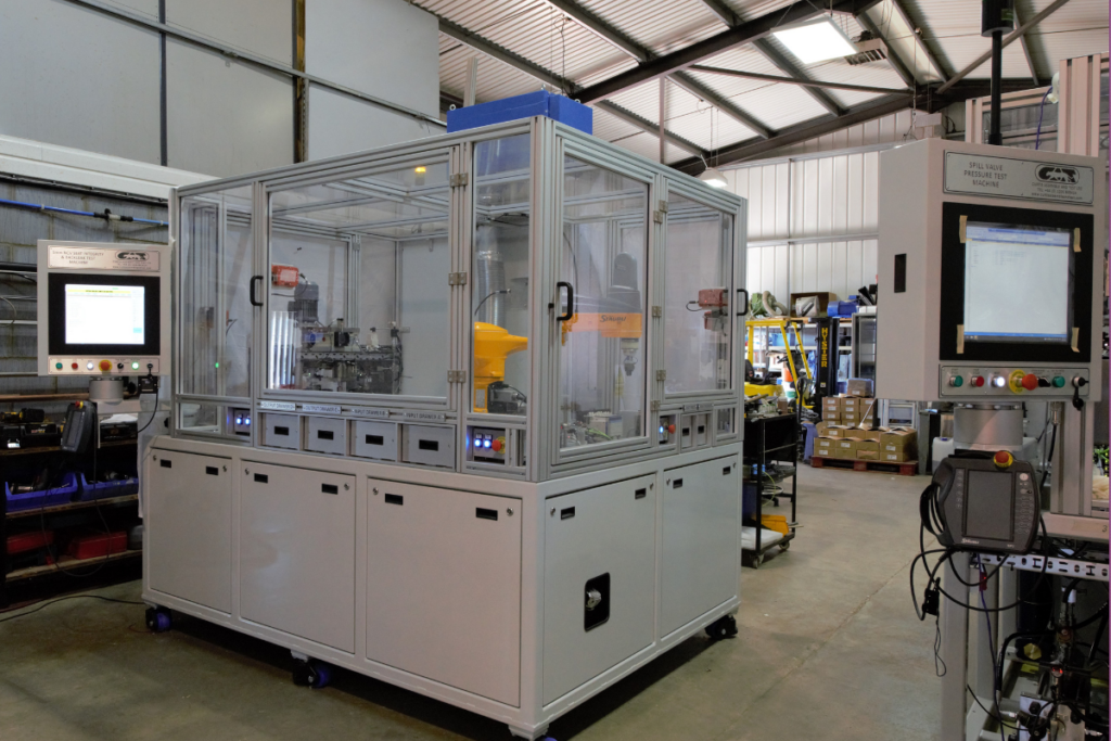 A bespoke precision lapping machine engineered by Curtis Assemble & Test, featuring dual robotic handling for fully automated component finishing.